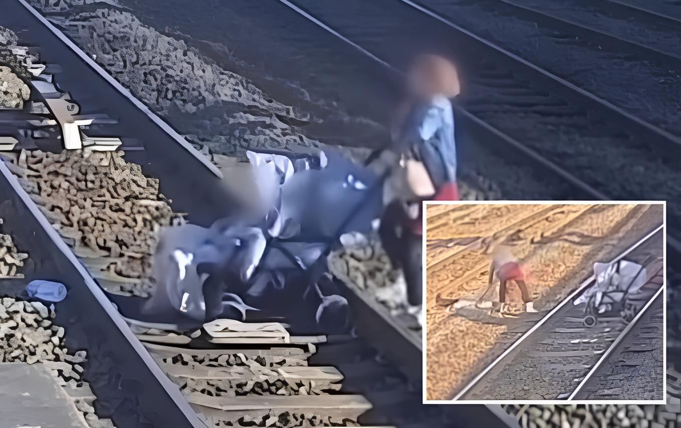 Mulher atravessa trilhos de trem com carrinho de bebê e causa indignação