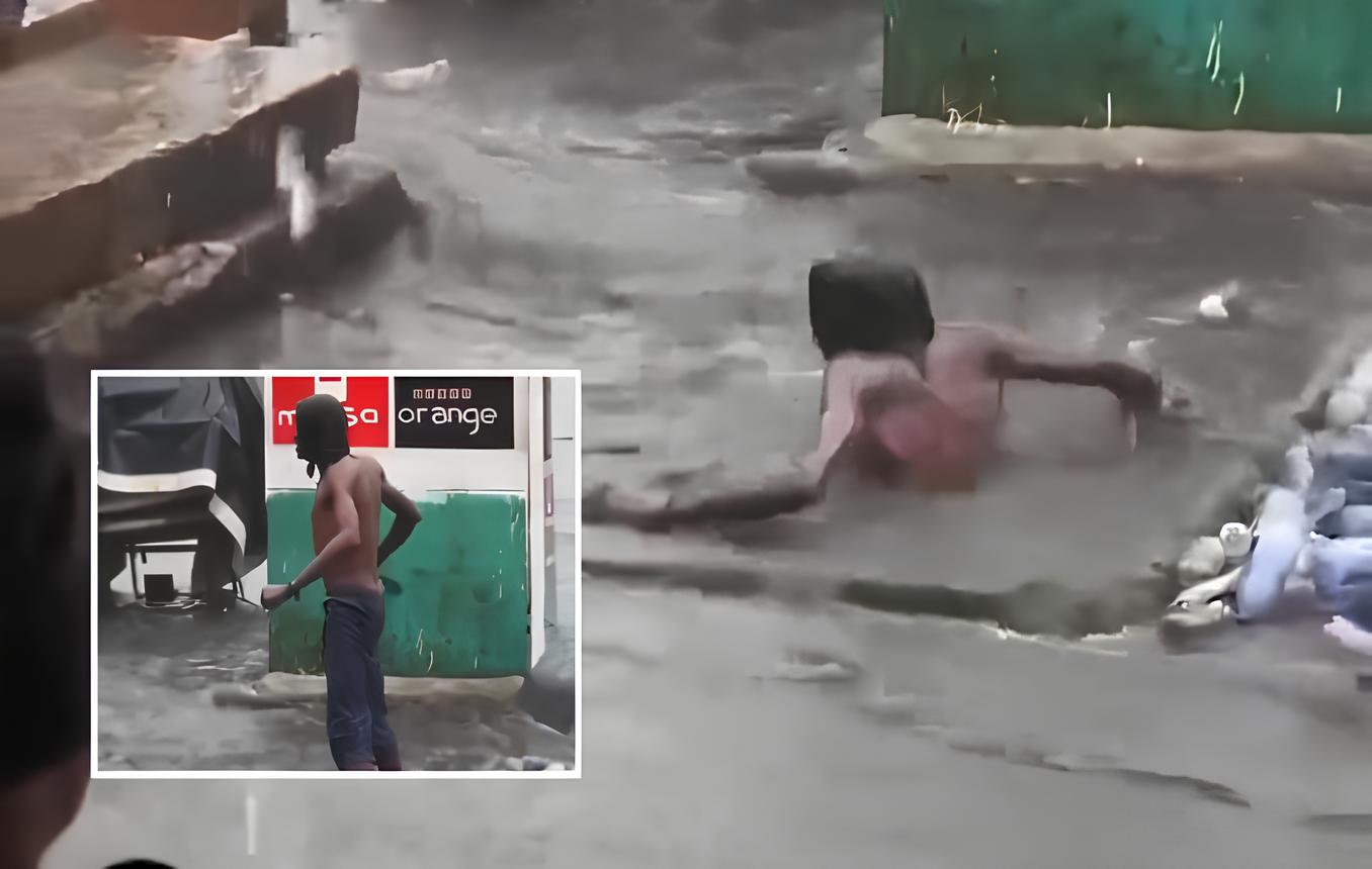 Homem sai de dentro de bueiro durante chuva e cena inusitada viraliza; veja vídeo