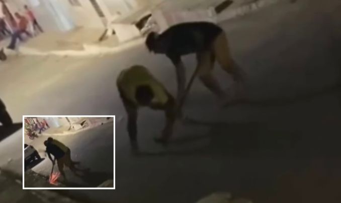 Irmão tenta matar outro com foice durante briga no meio da rua
