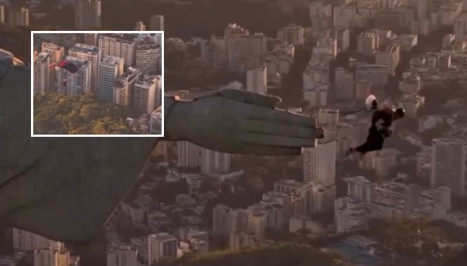 Sem autorização, homem escala Cristo Redentor e salta de paraquedas